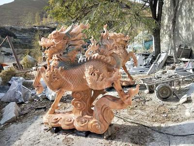 曲阳石雕 匠心独运的艺术瑰宝——以晚霞红麒麟为例